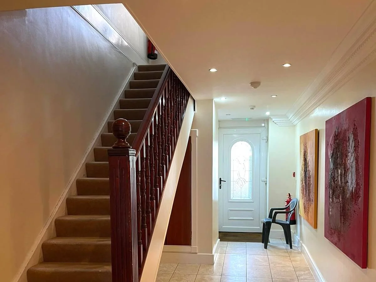 Hallway entrance walls painted white in Newcastle by Tulip Decor