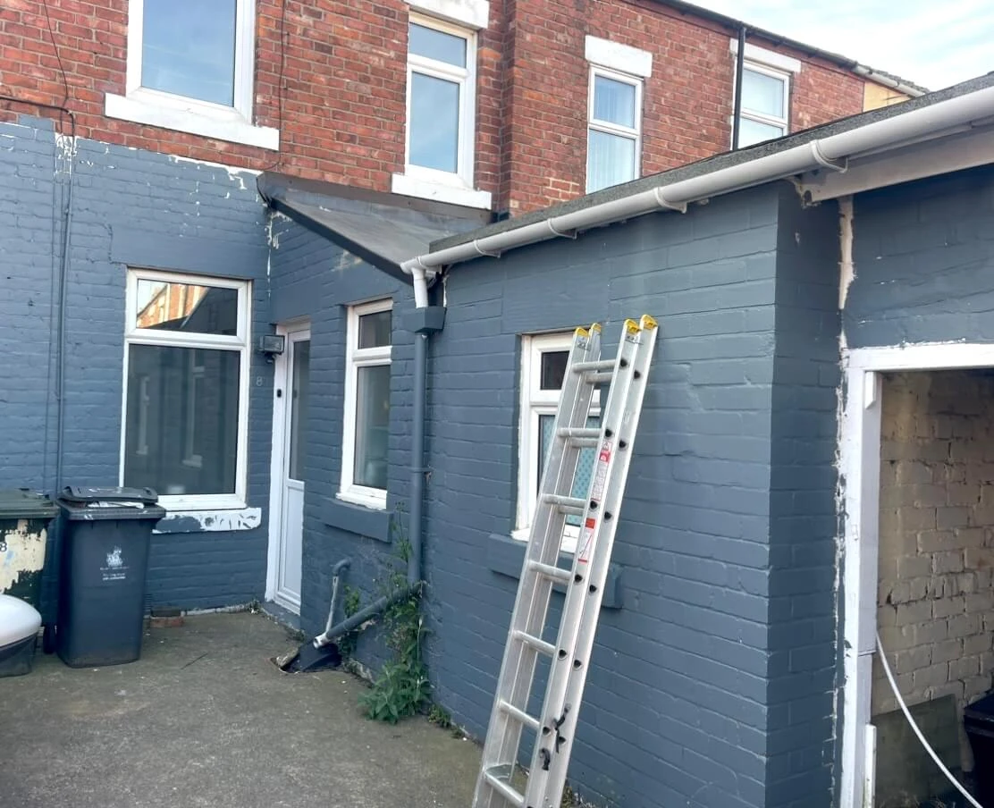 Brick walls painted on Newcastle house exterior by Tulip Decor